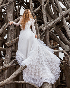 A bride in a ballgown wedding dress