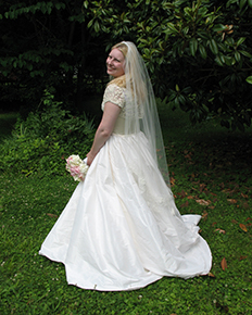 A bride in a ballgown wedding dress