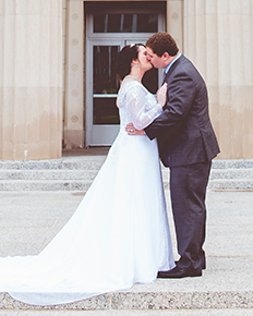 A bride in a ballgown wedding dress