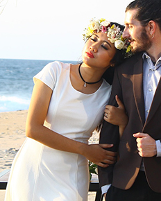 A bride in a sheath wedding dress